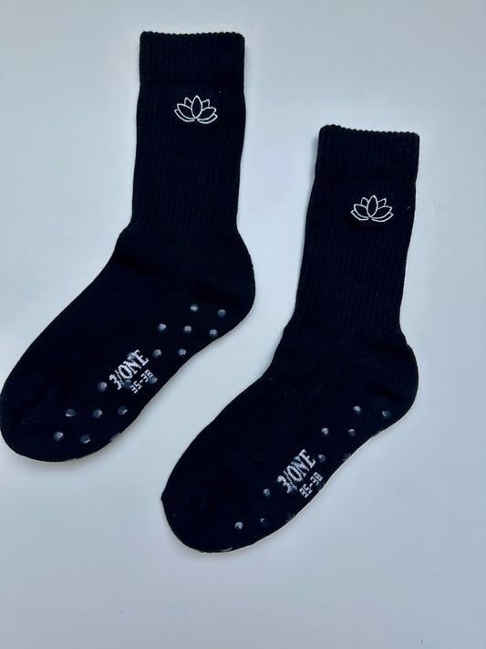 Grip-Socken schwarz Lotusblume mit Anti-Rutsch-Sohle